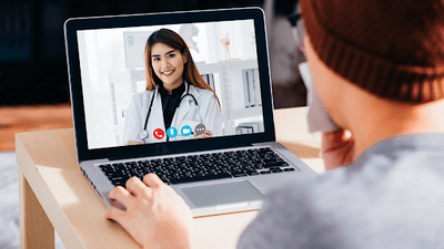 Patient on a video call with a doctor